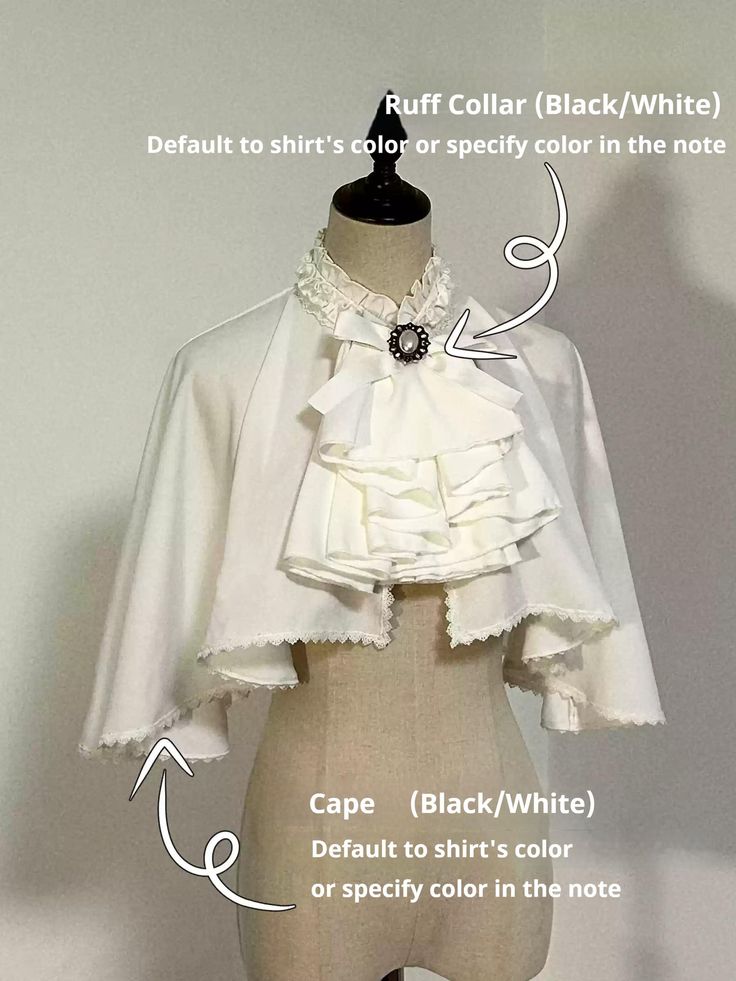 the image shows a white cape with a ruffled collar on a mannequin. the text indicates that the cape and collar are available in black or white, defaulting to the shirt's color unless otherwise specified in a note.