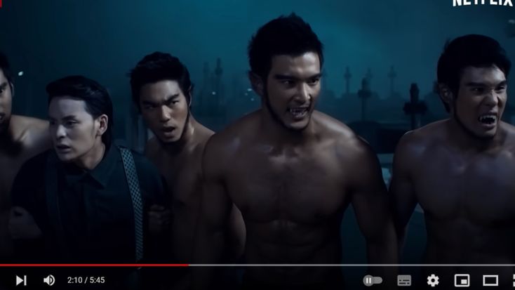 in a chilling tableau set against the backdrop of a moonlit graveyard, a group of barechested men with menacing expressions bare their fangs. their eyes gleam with an unholy light, hinting at their predatory nature. the atmosphere is heavy with suspense and fear, as if something sinister is about to unfold.