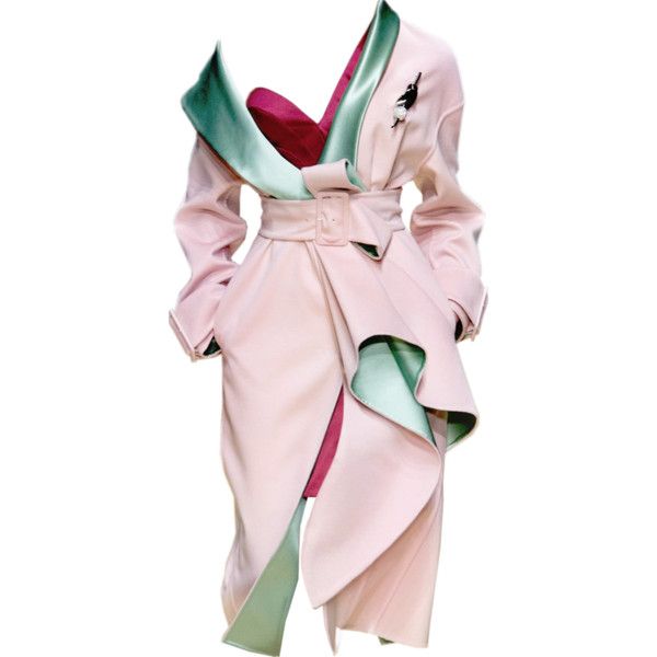 a pink dress with green satin lining and a matching belt is featured in the image. the dress has a wraparound design with a large ruffle on one side. a brooch is pinned to the upper part of the dress.