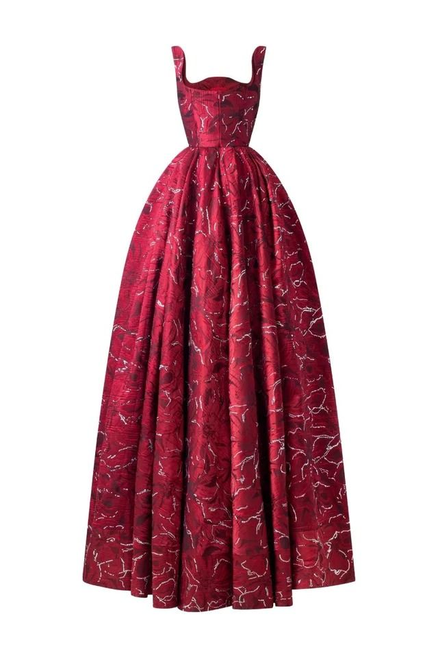 a floorlength red gown with a textured pattern is displayed against a white background. the dress features a square neckline, a sleeveless design, and an aline silhouette.