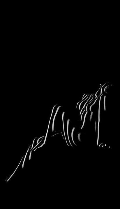 the image is a black and white photograph of a reclining female nude. the figure is rendered in a stylized manner, with the body appearing as a series of abstract lines and stripes. the overall effect is minimalist and sensual. the dark background further enhances the contrast between the light lines and shadows, creating a striking visual impact. the pose suggests relaxation and a certain degree of intimacy. the image is both evocative and mysterious, leaving much to the viewer's interpretation.