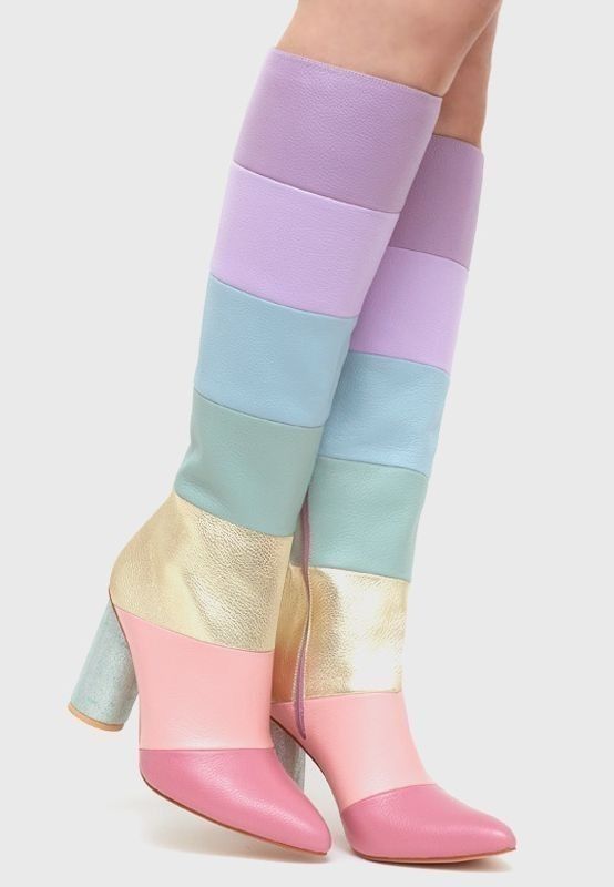 a pair of women's rainbow colored boots with a pointed toe and high heel.  the boots are made of leather and have a pastel color scheme.  the boots are a fashionable and stylish choice for any woman.
