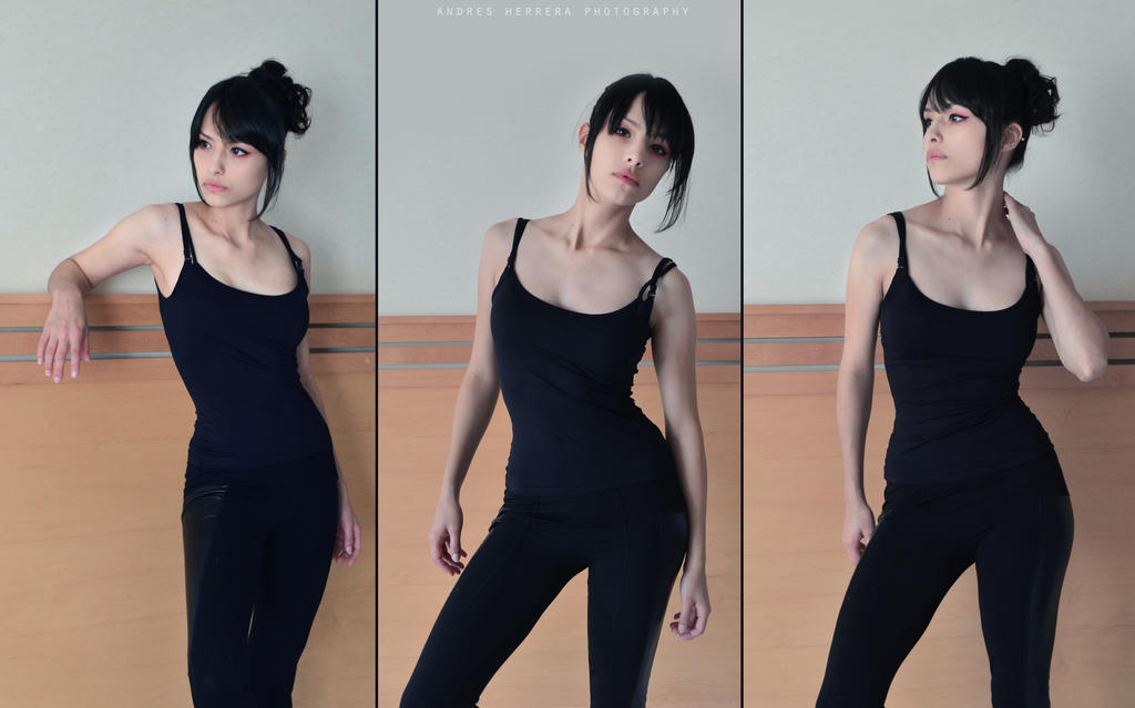 three portraits of a young woman with a black top and black pants. she is wearing her black hair in a bun with bangs. she is posing in front of a wall with wood trim. the portraits vary in pose and head orientation.