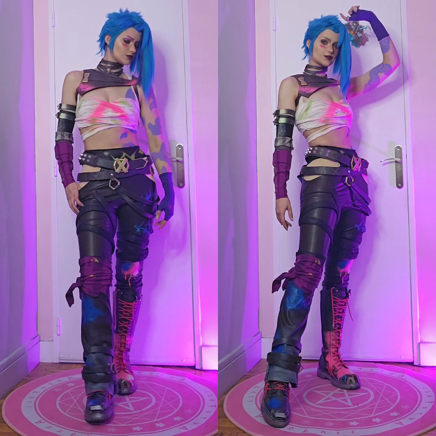 a person in a jinx cosplay from league of legends.  the cosplay is very detailed and accurate, including the characteristic blue hair, clothing, and boots. the cosplayer is posing in a room with purple lighting, showing off the costume from two slightly different angles.  a pink circular mat with a design is on the floor.