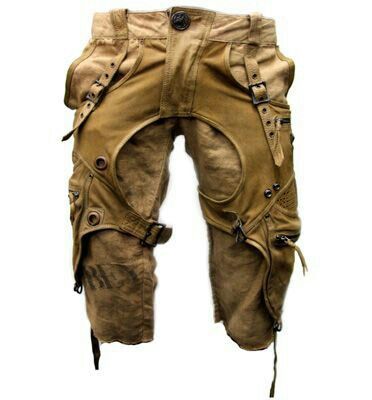 the image shows a pair of unique steampunkstyle pants.  they are khaki or beige in color and appear to be made from a canvas or similar heavy fabric.  the pants are heavily embellished with numerous leather straps, buckles, rivets, and other metal hardware. the leather straps and components create a complex layered design around the legs and thighs. the fabric itself shows a distressed or worn look, adding to the overall postapocalyptic or tactical aesthetic. the pants are intricately designed with a unique cut and numerous pockets.  they have a distinctly futuristic and somewhat militaristic feel.