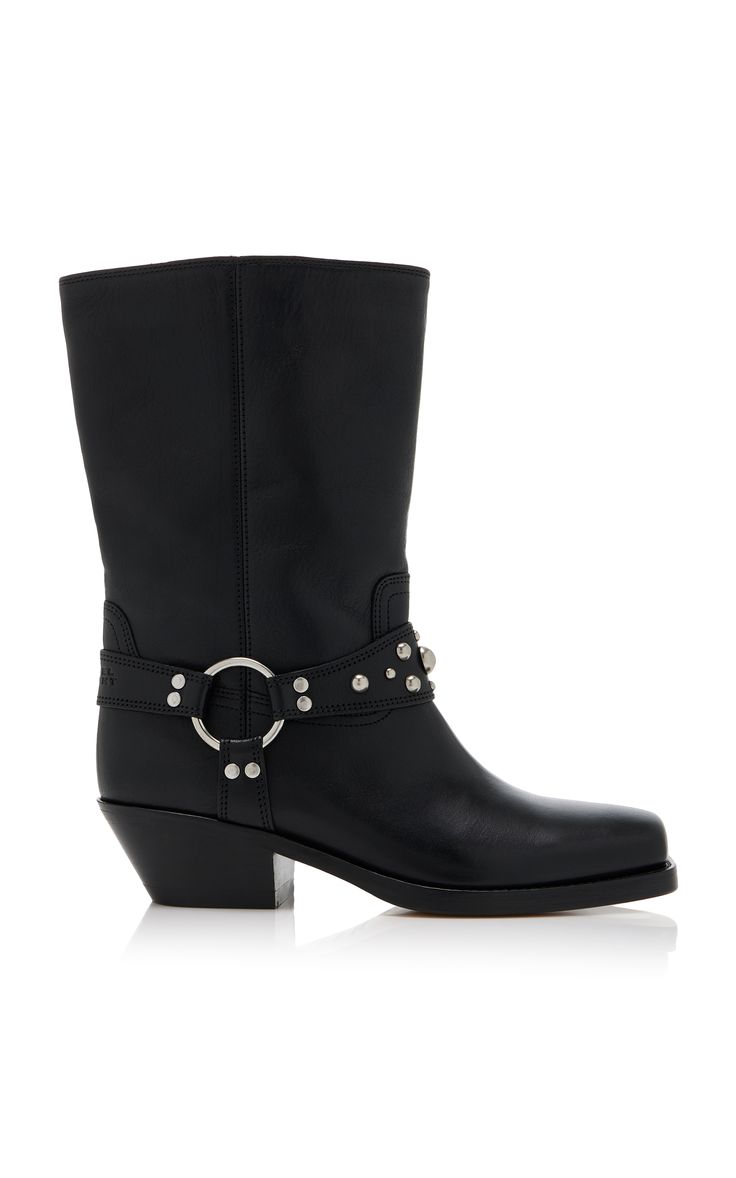 a pair of black leather women's midcalf boots are shown against a white background. the boots have a western style with a slightly pointed toe and a low heel. they are adorned with silver studs and a buckle strap across the instep. the boots are made of highquality leather and have a sleek, polished look.