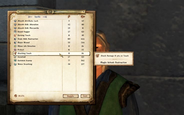 a screenshot of the elder scrolls: oblivion game, showcasing a character's inventory. the player has selected the "shock touch" spell, which deals 10 points of shock damage upon touch. the spell is a magic school destruction spell, and the description of the spell is displayed to the right of the inventory.