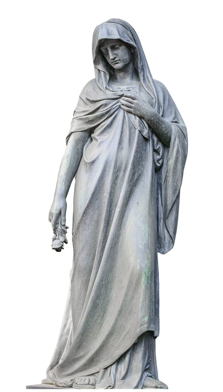 a fulllength statue of a woman stands against a black background, depicting a figure overcome with grief. she is wearing a long robe and a veil that drapes over her head, obscuring her face partially. her posture is stooped, and she has one hand on her chest and the other holding a flower. the statue appears to be made of stone or marble and shows signs of weathering, suggesting it is an outdoor sculpture. the statue is a symbol of mourning and sadness and is likely found in a cemetery or memorial garden.