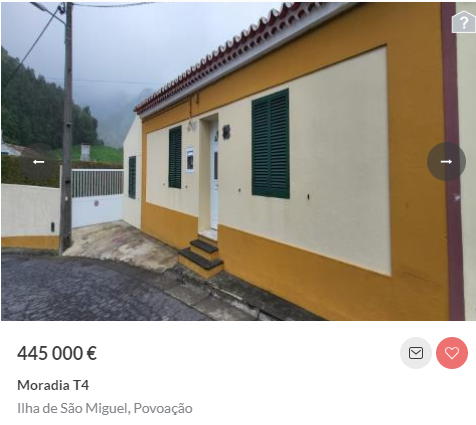 this is a photo of a yellow house with a green door and shutters. it is located on a paved driveway, and the house has a brick wall and some landscaping. there is a price tag attached to the image which reads: 445 000 €. the photo likely comes from a real estate listing.