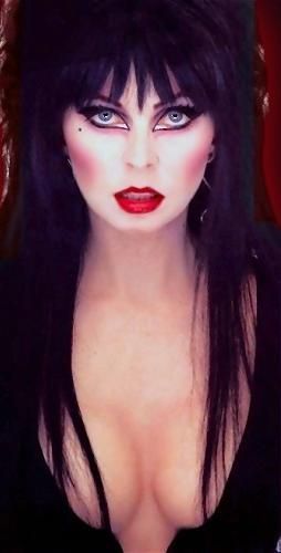 a woman with long black hair and