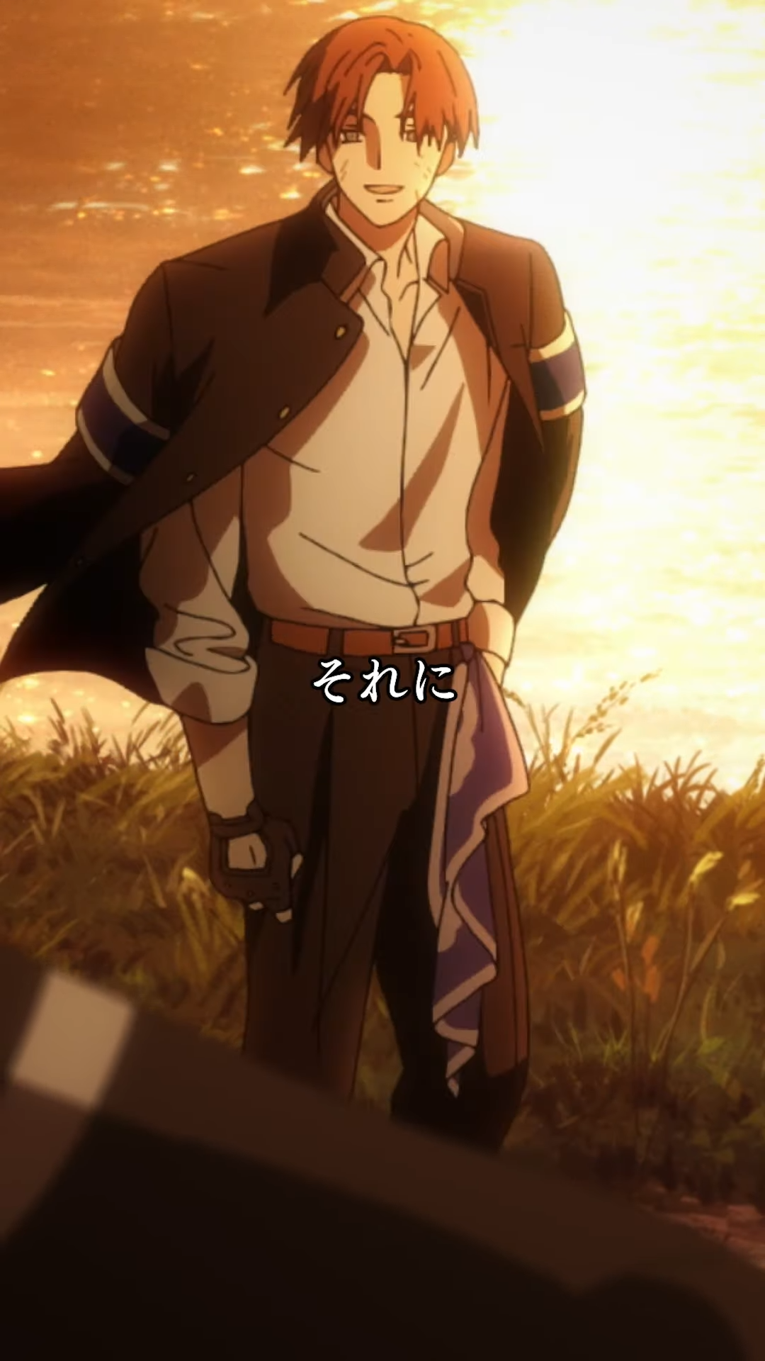 a young anime man with short reddishbrown hair and a confident smile stands in a field of tall grass. the setting sun casts a warm golden light behind him, creating a silhouette effect. he is wearing a dark blue jacket with a white shirt and dark pants. a blue cloth hangs from his waist.  the low camera angle contributes to his imposing and selfassured presence.