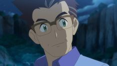 the image is of a man with brown hair and glasses. he is wearing a purple shirt. the image is set at night and the man is looking slightly to his right. the background is dark and blurry, making the man's face the central focus.  the man has a contemplative expression on his face.