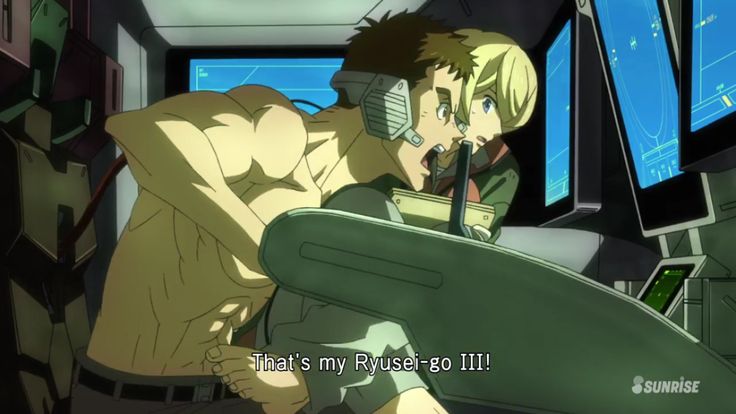 the image is from the anime series "gundam seed destiny" and depicts the protagonists shinn asuka, and his girlfriend lunamaria hawke. the pair are inside a cockpit for a humanoid robotic mech, called a gundam.  the pair are in the middle of a battle, and they are looking intense, with their faces grim. the weapons are visible, and the surrounding cockpit looks futuristic and hightech.