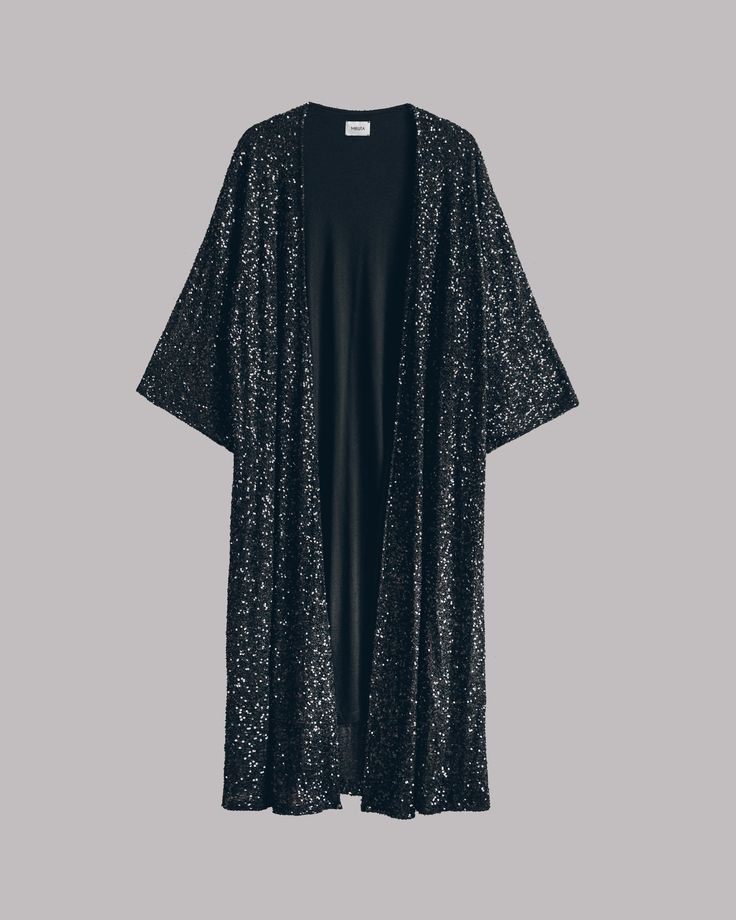 a black sequined kimono with long sleeves and an open front. the kimono is long and flowing, and it would be perfect for a special occasion.