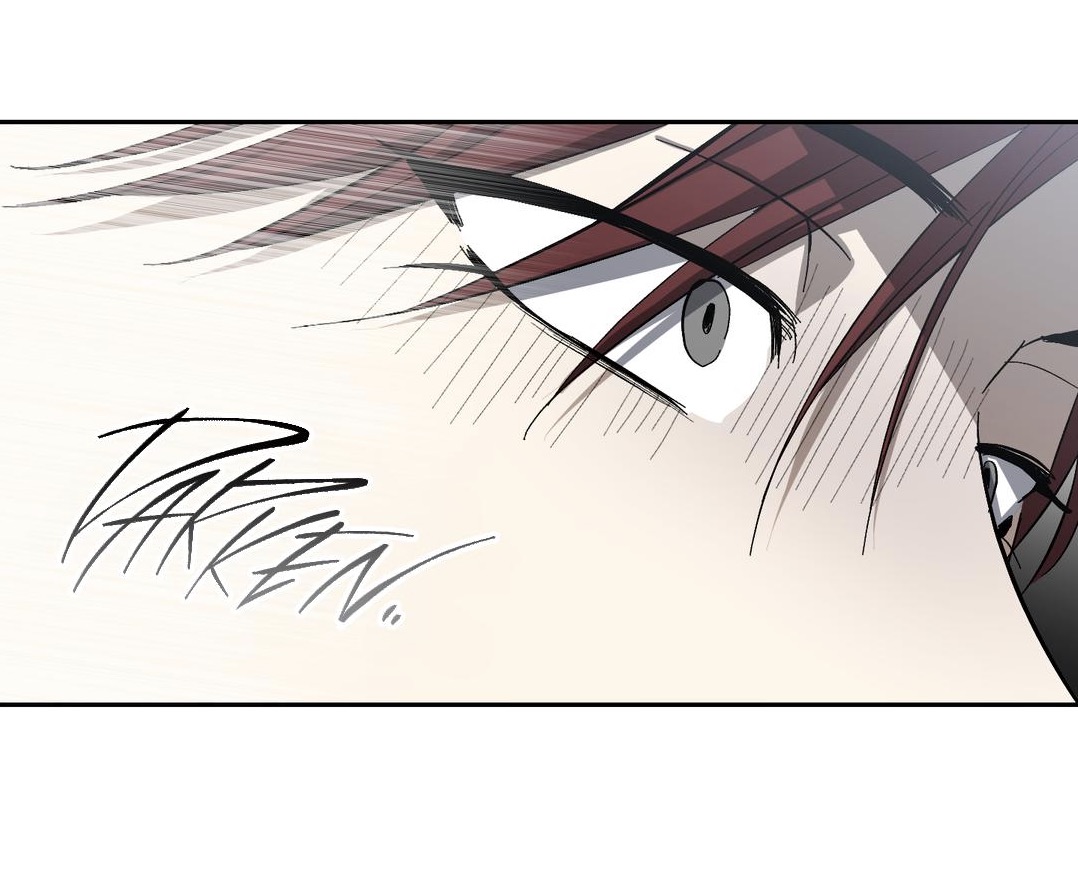 the image is a closeup panel from a manga or manhwa (korean comic). it features the face of a male character with reddishbrown hair. his eyes are wide open, conveying a strong emotion of shock, fear, or surprise. the style is detailed line art with shading to create depth and express the character's intensity. the word "paken" is written in a stylized script, likely representing a sound effect related to his emotional state or a sudden impact. the overall tone is dark and dramatic.