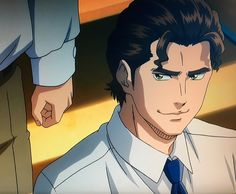the image shows a closeup of an adult male anime character with short, brown hair and green eyes. he is wearing a white, collared shirt with a blue tie. the background is blurry and suggests an indoor setting. the lighting is bright, creating a warm and inviting atmosphere.