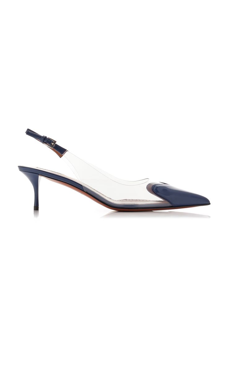 a pair of light blue, transparent, slingback heels with a pointed toe. the shoes are made of leather and have a clear heel. they are a fashionable and elegant choice for any occasion.