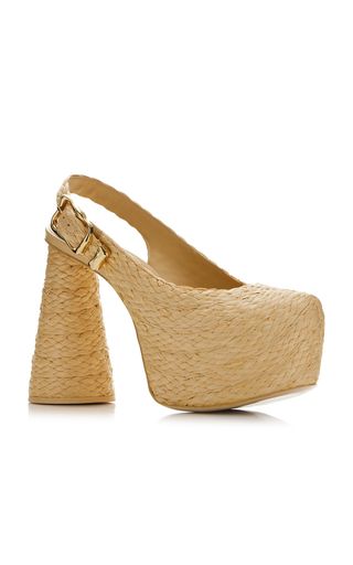 this is a pair of women's platform sandals made of straw. the sandals are beige and have a slingback strap. the sandals are perfect for summer.