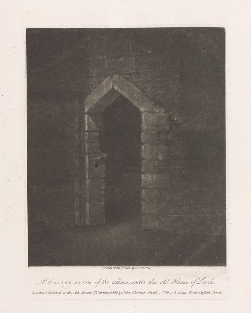 a black and white engraving depicts a stone doorway leading into one of the cellars under the old house of lords. the doorway is arched and constructed of large stone blocks. the interior is dark and indistinct. the inscription reads "drawn & engraved by j.t.smith. a doorway in one of the cellars under the old house of lords. london. published as the act directs 1st january 1804 by john thomas smith. n.36. newman street oxford street."