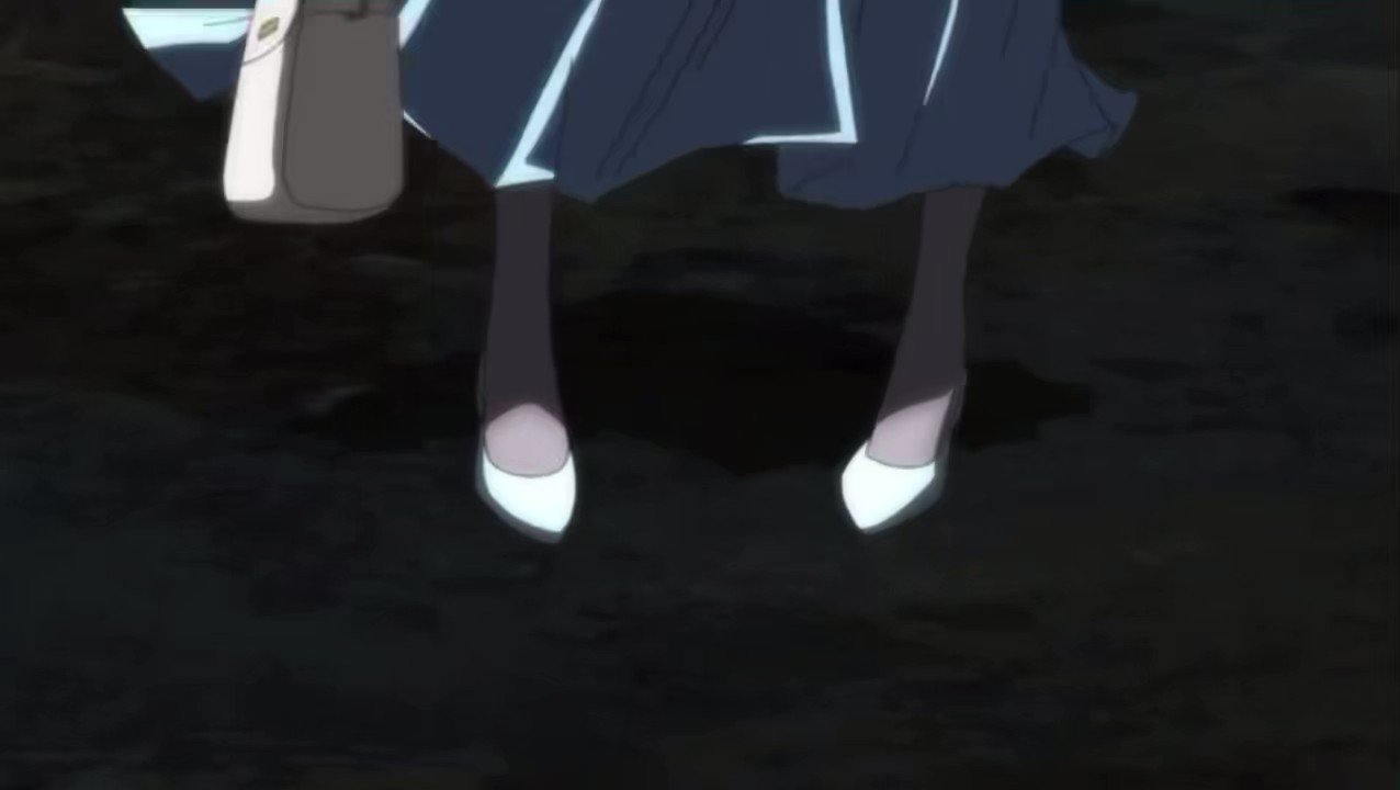 an anime girl with white shoes, a white bag and a blue dress stands in a dark place. only her legs and feet are visible.