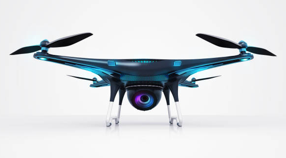 a futuristic drone, painted in black and with blue accents, is shown isolated on a white background. the drone has a camera on the bottom, and the propellers are folded up.