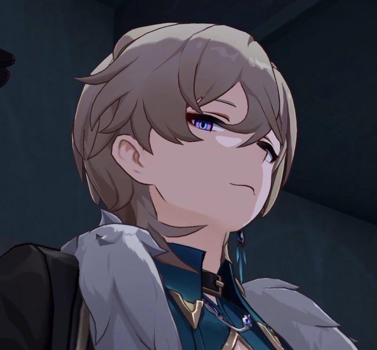 an anime boy character with white hair and blue eyes is shown from the chest up. he is wearing a blue and gold outfit with a white fur collar. he has a serious expression on his face and is looking to the side. the background is a dark blue.