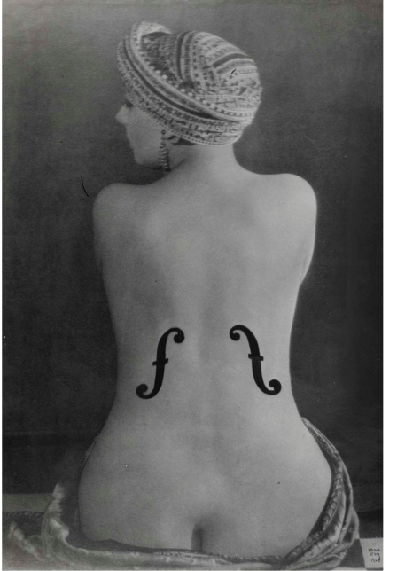 a black and white photograph of a woman's back. she is nude from the waist up, and wears a patterned turbanstyle hat.  two fholes, resembling those found on a violin or cello, are superimposed onto her lower back. the image has a vintage or artistic quality. the overall mood is sensual but also artistic and slightly mysterious.