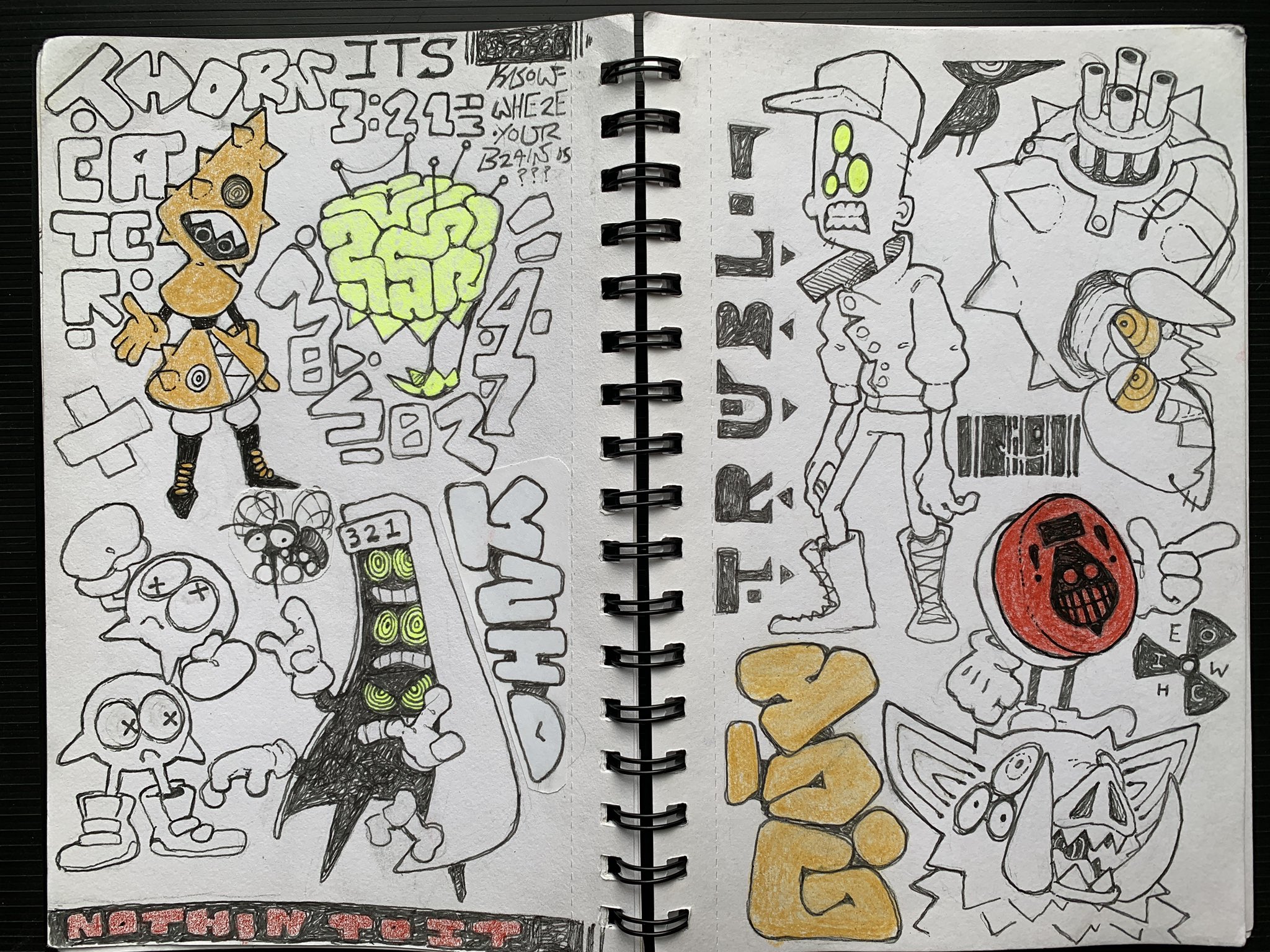 the image shows two pages of an open notebook filled with marker drawings in black, yellow, and grey.  the whimsical, cartoonish drawings appear to reference street art or graffiti.  the drawings include monsters, robots, and a fly.  along with the drawings, there are illegible words written on the pages as well as some recognizable words like "horror," "star," and "slime."  there are numbers on the pages, too, like "321" and "3:28."  the notebook is spiralbound.  the overall aesthetic is playful, quirky, and somewhat dark.
