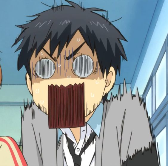 this is an anime image of a boy wearing a school uniform, looking shocked with his eyes wide open, mouth wide open, and jaw dropped. he is standing in a classroom in front of a window. the background is a blurry light blue color.