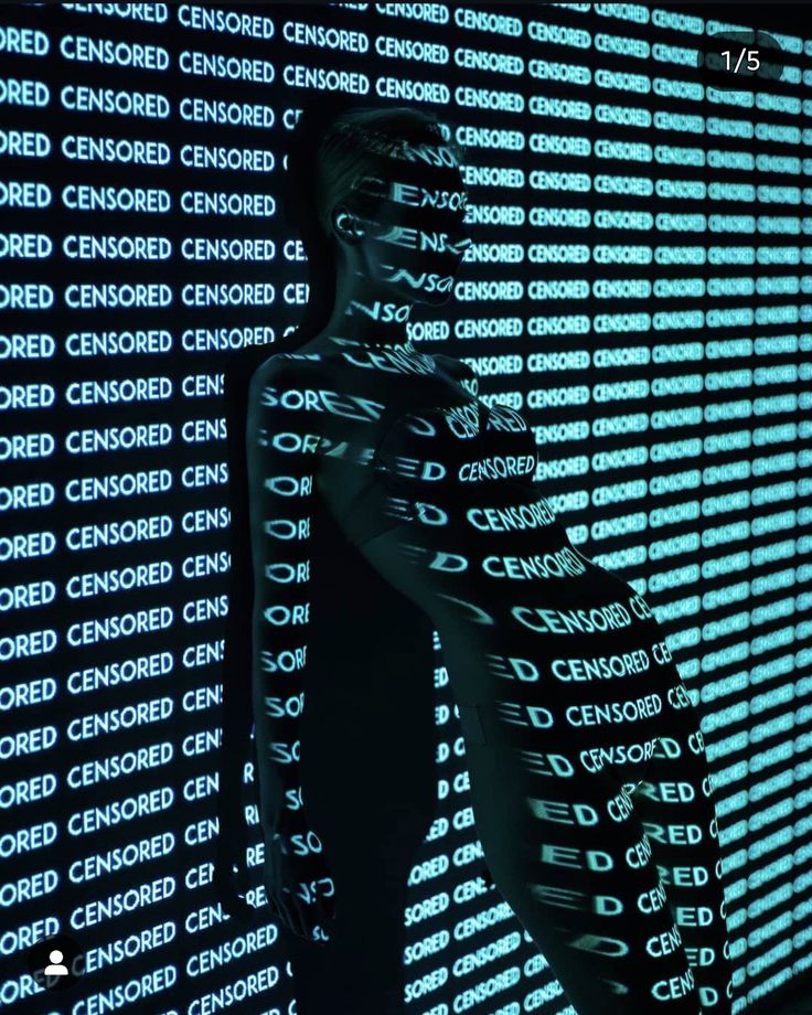 the image shows a silhouette of a woman's body.  the silhouette is not entirely solid; it's somewhat translucent and appears to be created or enhanced by projection mapping. the background is a grid of repeating "censored" text in a cyan or turquoise neon color.  the projection of the "censored" text onto the woman's body creates a layered and visually complex effect. the overall aesthetic is futuristic, abstract, and artistic.  the image seems to explore themes of technology, censorship, and the body.