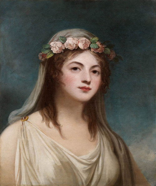 the painting depicts a young woman in a neoclassical style. she is positioned slightly offcenter, gazing directly at the viewer. her hair is adorned with a crown of pink roses and green leaves, and a sheer veil drapes over her head. she wears a simple white gown, evocative of classical attire. the background is a muted bluegreen, providing a soft contrast to the subject's pale skin and the delicate colors of the flowers.