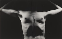the image is a black and white closeup photograph of a male nude torso.  the subject's arms are raised above their head, creating a symmetrical pose. the lighting is dramatic, with strong contrasts between light and shadow, highlighting the musculature and form of the body.  the background is entirely dark, drawing all attention to the subject. the overall feel is stark and somewhat abstract, focusing on the shapes and tones of the body. a thin, vertical line bisects the image down the middle.