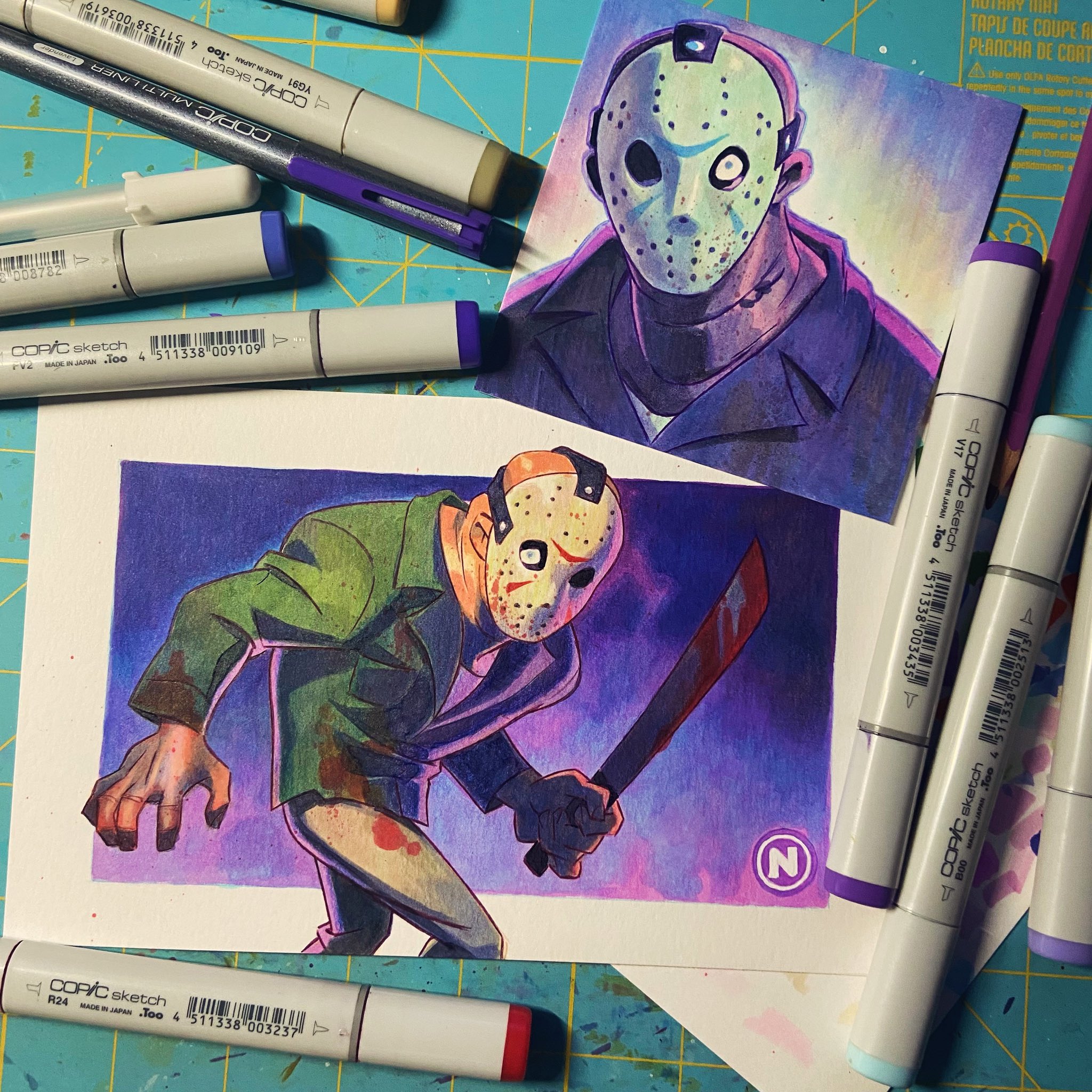 this image shows a drawing of jason voorhees from friday the 13th. he is drawn in a menacing pose, holding a machete and wearing his iconic hockey mask. the drawing is done in copic markers and is very detailed. there are also other copic markers laying around the drawing, some of which are labeled. the background of the image is a blue grid pattern.  the drawing is of good quality.