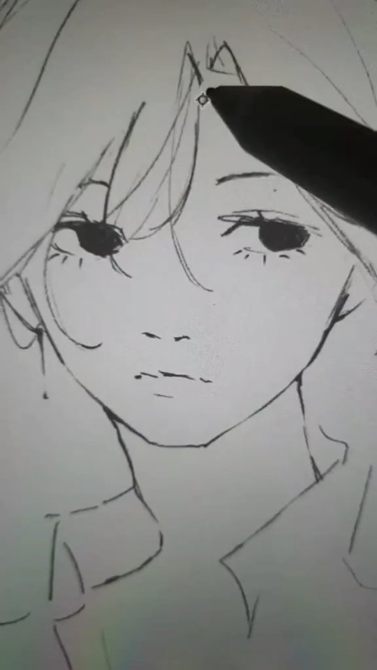 a closeup shot of a digital drawing in progress. the image shows a stylized animestyle girl's face and upper body, with her hair partially obscuring her forehead. the artist is using a stylus to add details to the drawing, with part of the stylus visible in the upper right corner. the drawing is in black and white, and the lines are relatively loose and expressive.  the style suggests a young girl with a slightly melancholic or pensive expression.