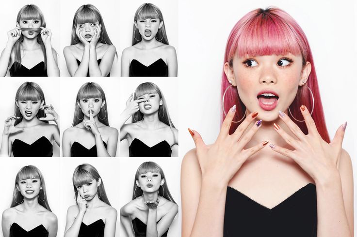 a woman with pink hair, wearing a black strapless top is looking at the camera with a surprised expression. her hands are in front of her face and her nails are painted in a variety of colors.  above her are 9 black and white pictures of the same woman, but with different facial expressions and poses.