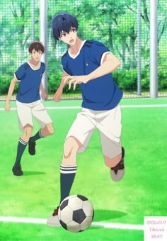 he image shows two boys playing soccer on a field. the boy on the right is in the foreground and is about to kick the ball. the boy on the left is in the background and is running. the field is green and there are white lines on it. the sky is blue and there are clouds in it.
