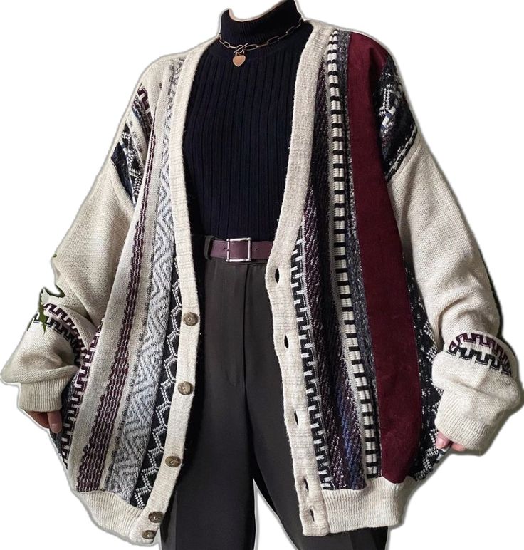 the image shows a beige oversized cardigan with a multicolored pattern, including burgundy stripes. it's worn over a black turtleneck and dark brown highwaisted pants with a brown belt. the style is vintage or retro, possibly reminiscent of the 90s.  the overall aesthetic is stylish and puttogether. the image is welllit and provides a clear view of the clothing details.