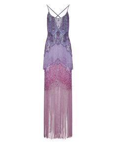 a beautiful purple dress with beaded lace and a long fringed skirt, perfect for a special occasion. the dress is sleeveless, has straps, and a halter neck.