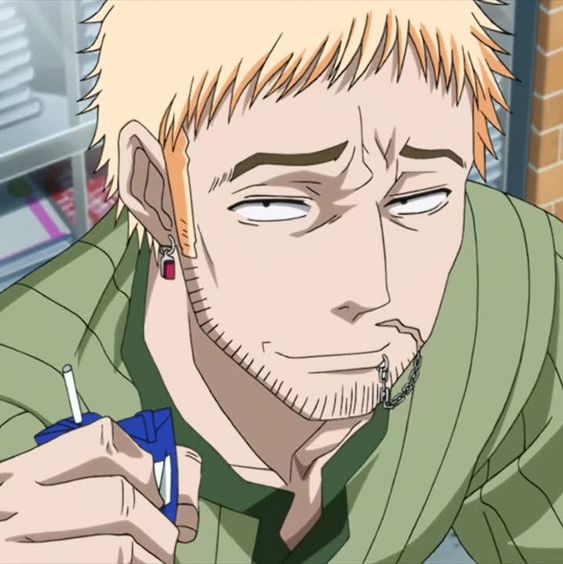 a portrait of an anime man with blonde hair, stubble and a soul patch, wearing a green vneck shirt. he is smirking with halfclosed eyes while holding a blue and white lollipop container in his right hand. he has a red stud earring in his right ear and a lip ring with a chain on the right side of his mouth. the image appears to be a screenshot or still image from an anime television show or movie.