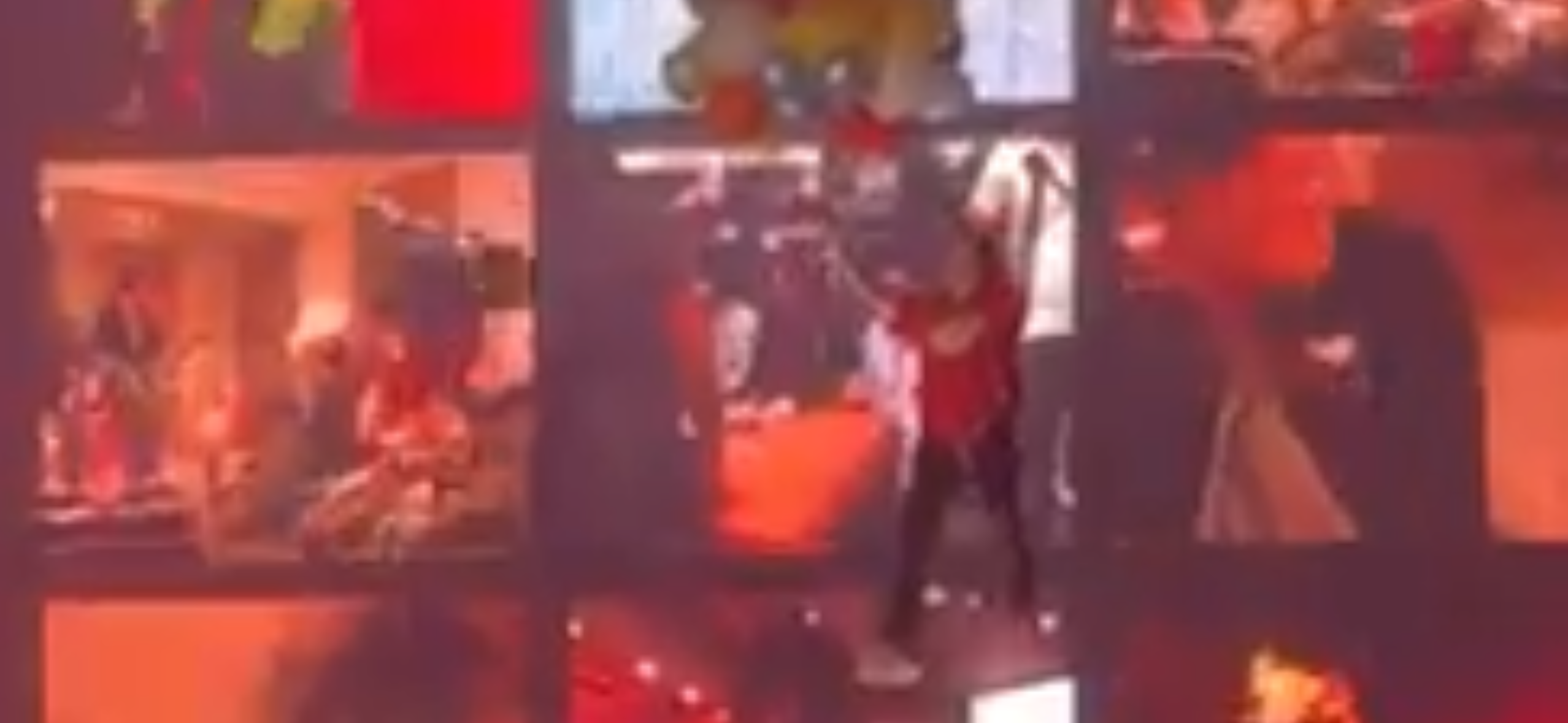 a rock band performs on stage, with the singer in the center. the band is illuminated by spotlights, and the crowd is enthusiastically watching the performance. the stage is adorned with red lighting, creating a vibrant and energetic atmosphere. the band members are giving their all, their passion for music evident in their performance. the audience is captivated by the music, enjoying the energy and excitement of the live concert.