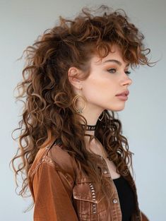 a woman with curly brown hair is shown in a side profile portrait. she is wearing a brown jacket, earrings, and a choker.