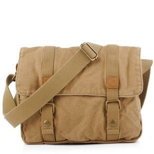 a tan canvas messenger bag with a shoulder strap and buckle closures.