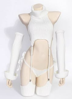 a mannequin is wearing a white knitted sweater with cutouts for the shoulders and torso. it is paired with a garter belt and thighhigh stockings, along with matching gloves. the