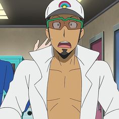 a cartoon man with dark skin and black hair with a white lab coat open in the front, a white hat with a rainbow design on it, and green tinted goggles over his eyes. his mouth is open and he has a surprised expression on his face. the background is inside a building and is primarily white and gray.