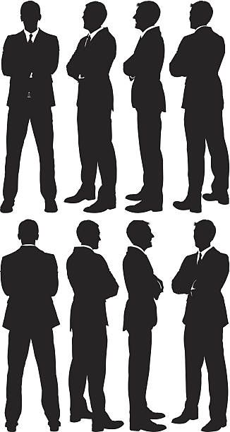 the image shows eight silhouettes of men in suits and ties standing in a row. they are all facing the right side and are standing in a formal position. the silhouettes are black against a white background.
