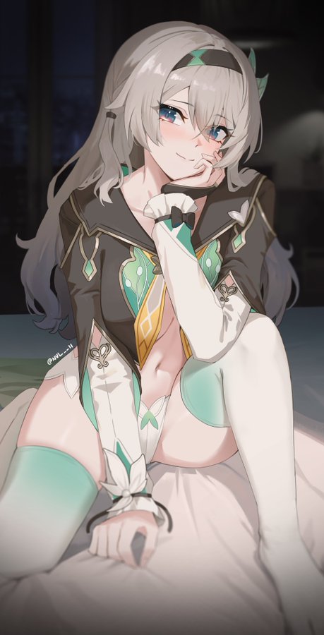 a beautiful anime girl with white hair and green eyes is sitting on a bed. she's wearing a white and green dress and is smiling. she looks very happy. the bedroom is dimly lit, and the girl is the only thing in focus. she looks so cute and lovely, with her hands tucked under her chin. she has a slightly mischievous look in her eyes.