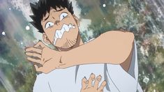 a man with short black hair and a white tshirt is shown in a state of panic or fear. his eyes are wide and his mouth is open, with spittle flying out. the background is a blurry mix of white, grey, and green, suggesting a chaotic or overwhelming environment.