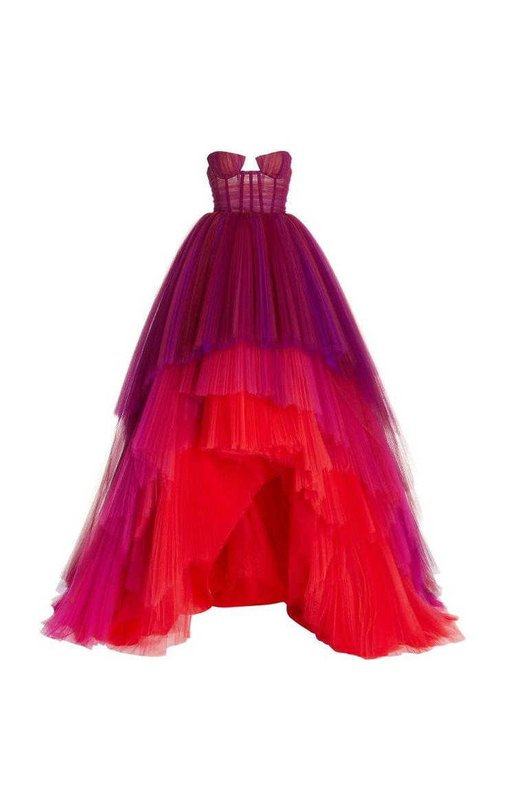 a strapless ombre gown. the colors fade from purple at the top to red at the bottom, and the skirt is made of layered tulle.