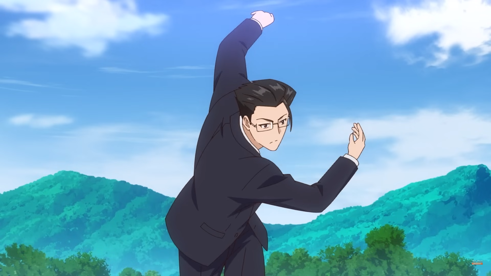 man in a suit is posing in front of a mountain landscape. the sky is bright blue with some clouds, and the sun is shining. the man has dark hair and glasses and is making a playful pose with his arms raised. the overall tone of the image is cheerful and energetic.