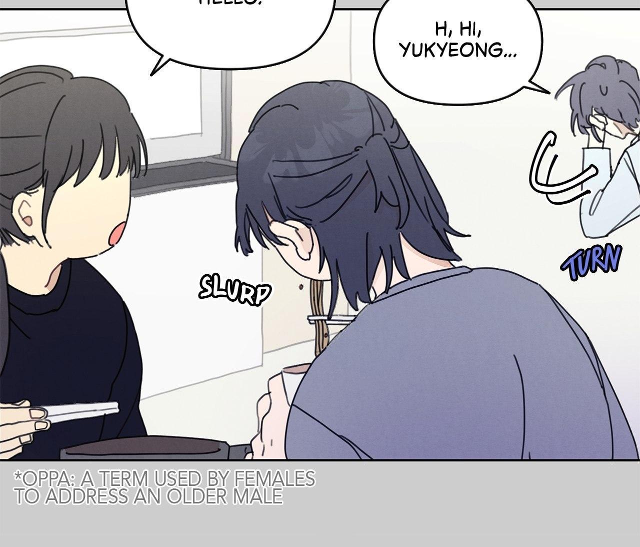 he image is a panel from a webtoon or manhwa. it features three characters: two women and one man. the women are in a kitchen setting, one of them appears to be eating something and the other one is surprised to see the man, who is shown turning around shyly. the speech bubbles contain dialogue in english and korean.  the caption below explains the korean term "oppa". the art style is soft and cute, with pastel colors and simple linework.  the overall mood is light and romantic.